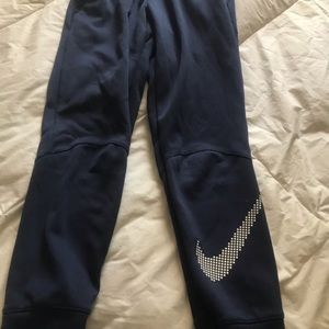 Nike boys navy blue pants. Size small